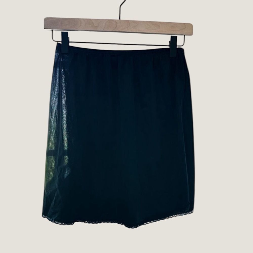 ✨3/$10✨ Vintage black slip skirt with slit and Lacey trim